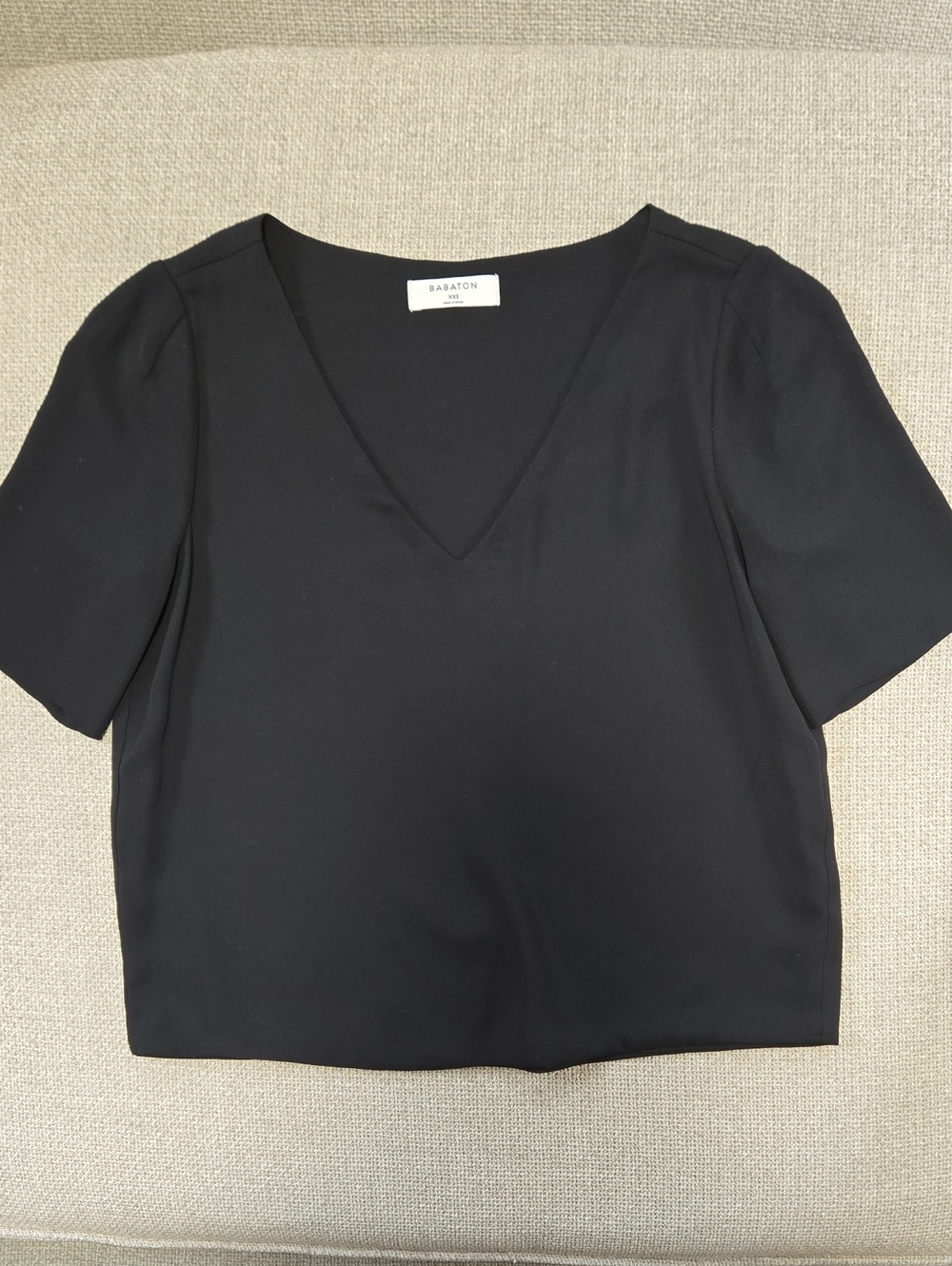 Babaton Black V-Neck Short Sleeve Top - Sleek Minimalist